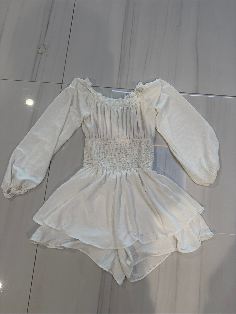 Ladies White Smocked Waist Long Sleeve Dress with attached shorts.